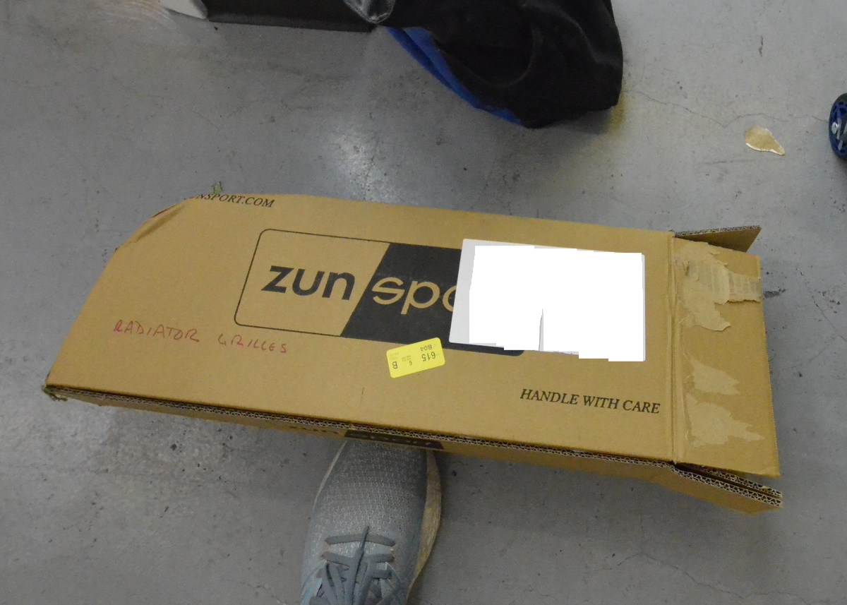 The Zunsport box as delivered, dinged corner