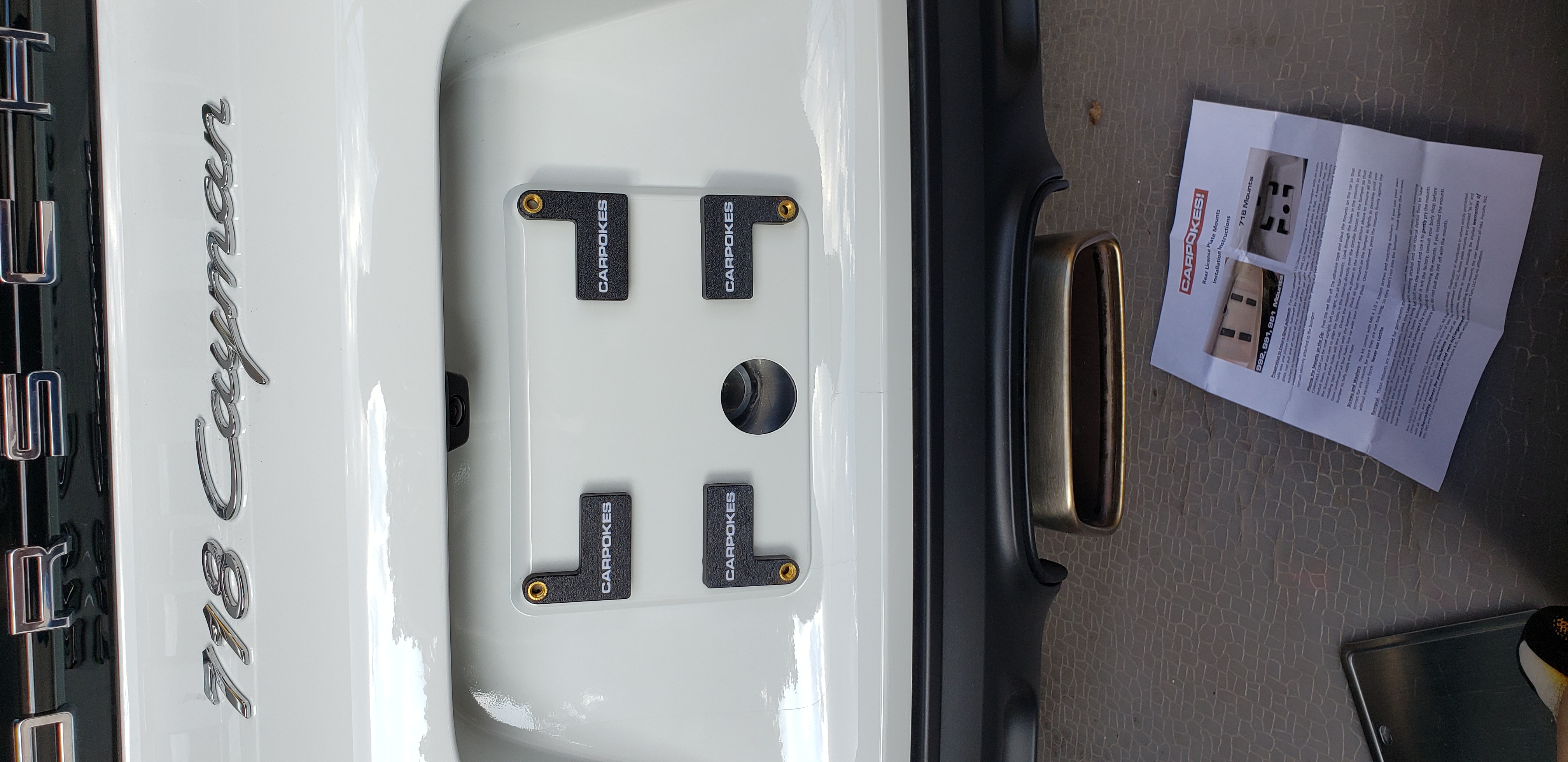 lining up the pads on the back of the plate and plate mount.