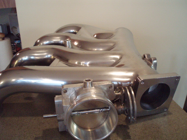 modded intake and billet 66mm t body.JPG