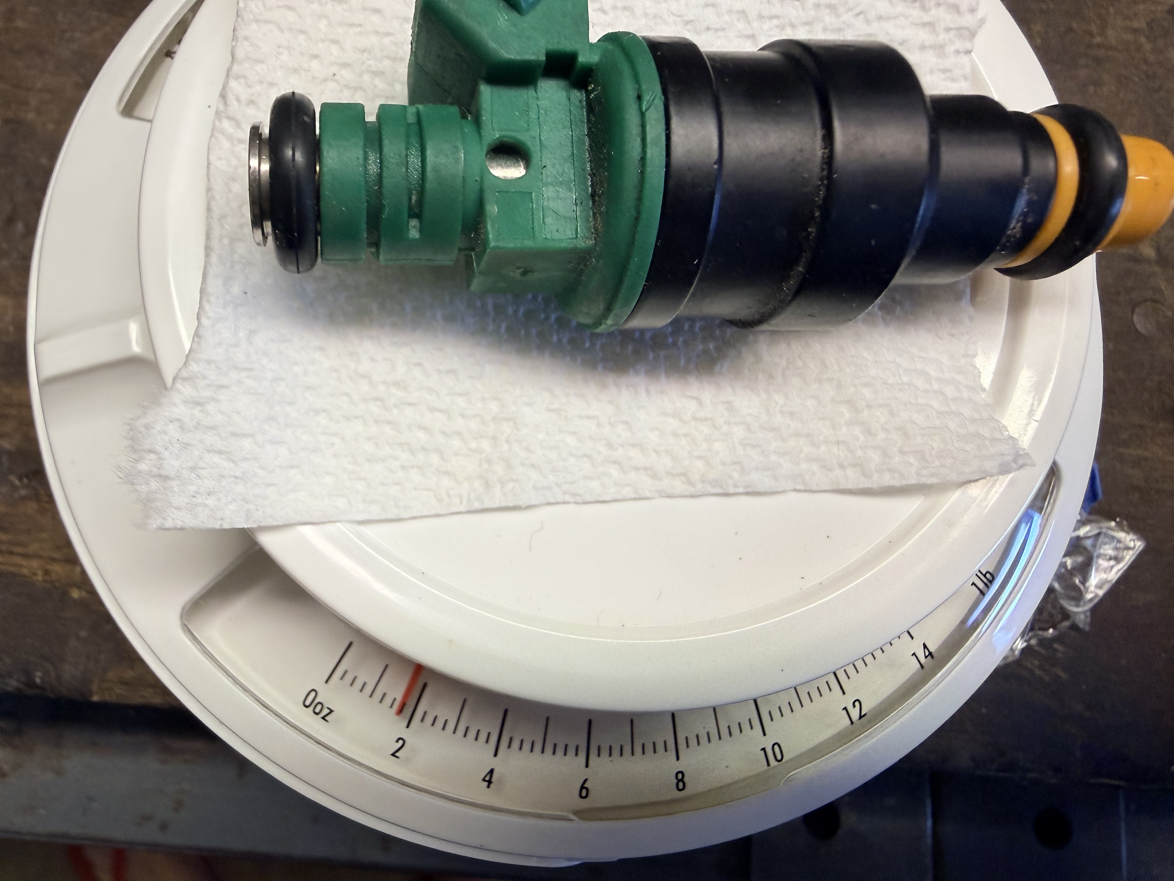 Fake Turbo injector. Weighs considerably less than oem. 1.75 oz.