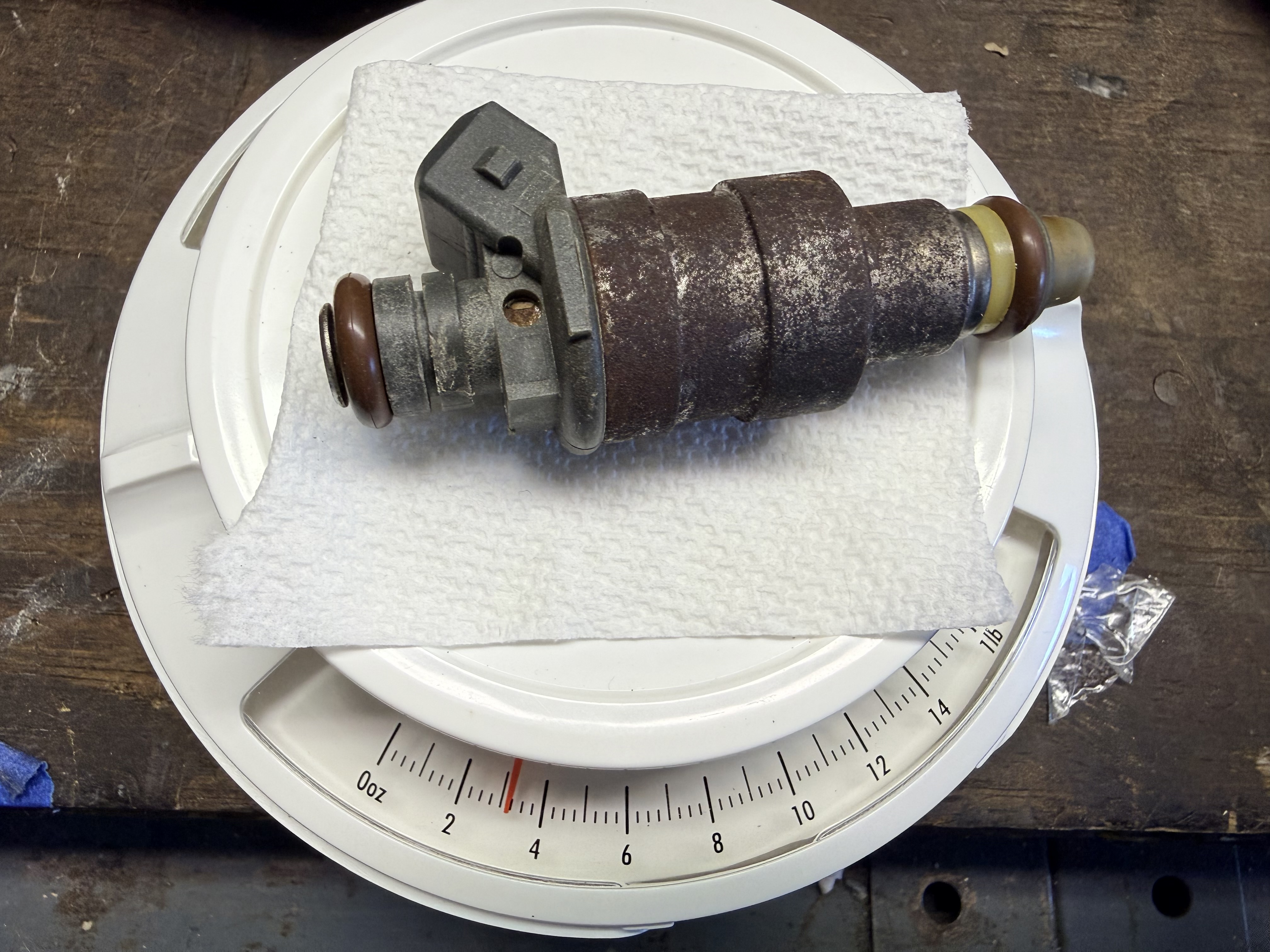 OEM Bosch 944 injector weighs 3.25 oz.