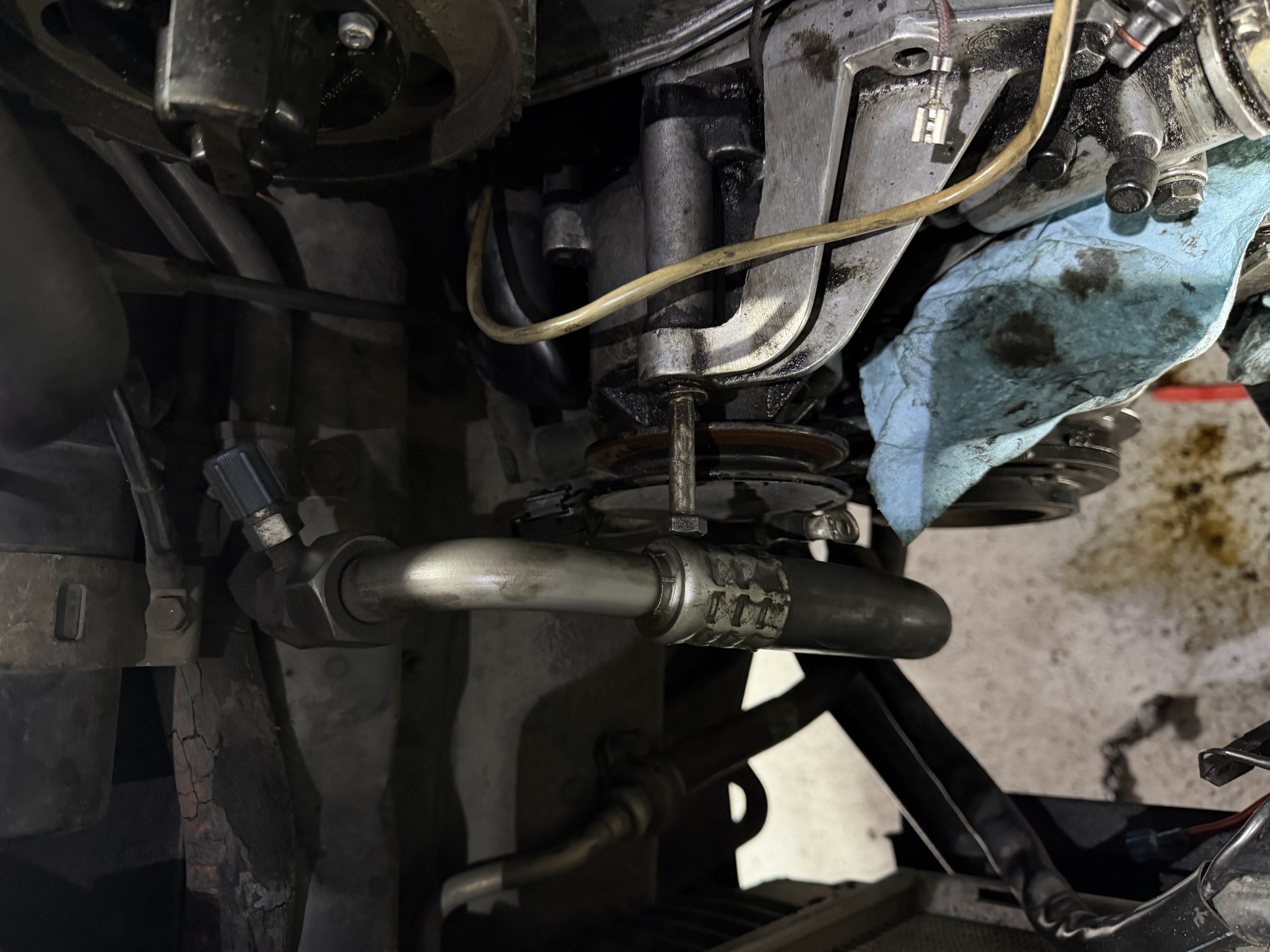 This pipe the hard pipe , not the blue port was loosened and pressure released.